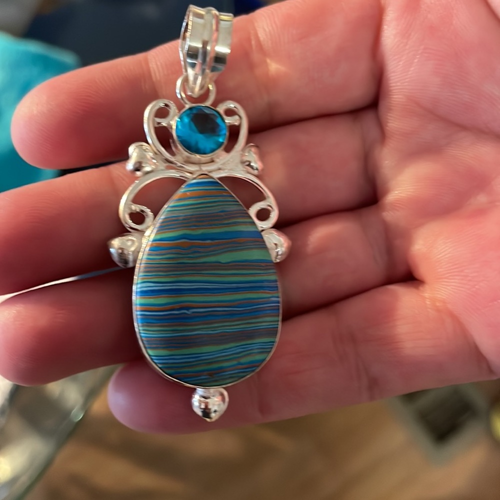 Gorgeous Calsilica rainbow genuine stone with blue topaz gemstone sterling a/o